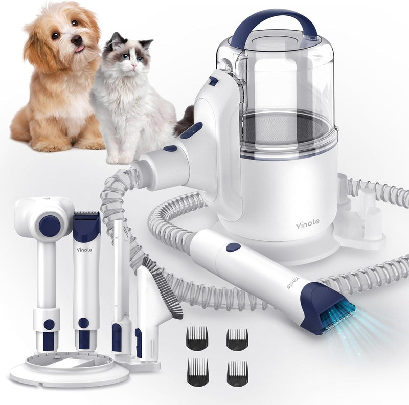 White pet grooming vacuum with attachments and blue accents shown with small dog and cat