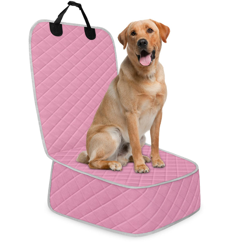 Golden Labrador sitting on pink quilted car seat cover with back panel raised
