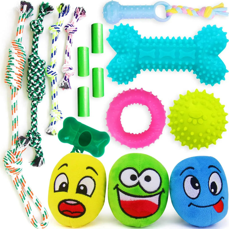 Colorful dog toy collection with rope toys, rubber rings, squeaky balls and plush emoji faces