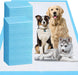 Stack of blue dog training pads next to three dogs of different breeds on white background