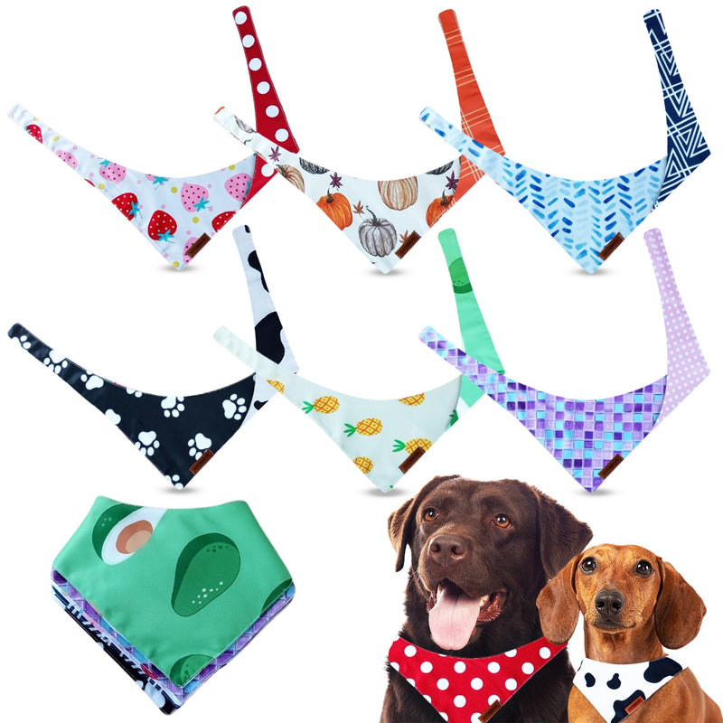 Two dogs wearing colorful patterned bandanas with collection of 7 decorative dog bandanas