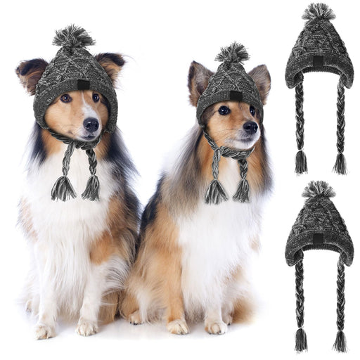 Two dogs wearing gray knitted winter hats with pom-poms and braided ear flaps, product views shown