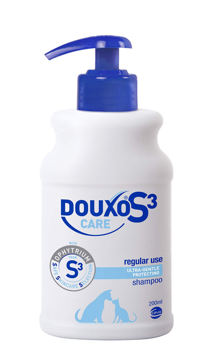 White pump bottle of DOUXO S3 Care shampoo with blue dispenser pump and pet silhouettes on label