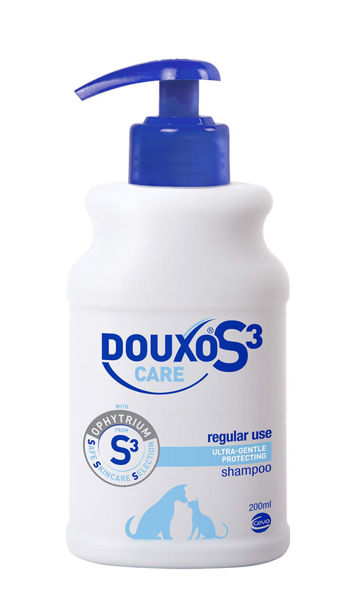 White pump bottle of DOUXO S3 Care shampoo with blue pump dispenser and product labeling