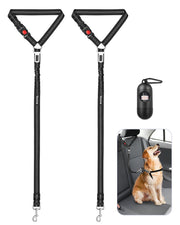 Two black dog car safety harnesses with reflective stitching and adjustable straps shown flat