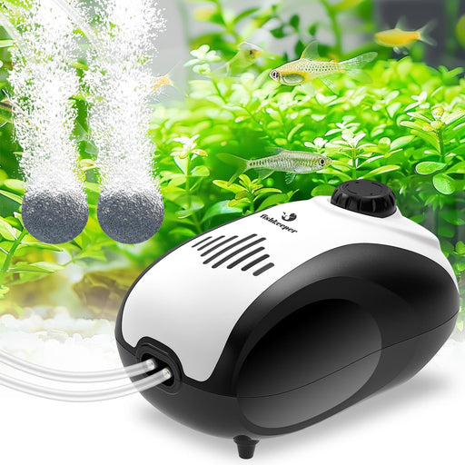 White and black dual-outlet aquarium air pump with tubes connected to bubblers in green planted tank