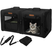Black pet carrier duo with silver tabby cat inside right compartment, shoulder strap shown below