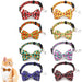 Eight colorful cat bow tie collars with fruit patterns including strawberries, watermelon, kiwi