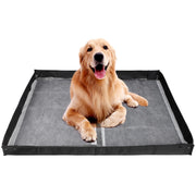 Golden retriever lying on gray elevated dog pee pad holder with black frame against white background