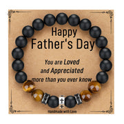Black onyx and tiger eye bead bracelet with cross charm on Happy Father's Day card