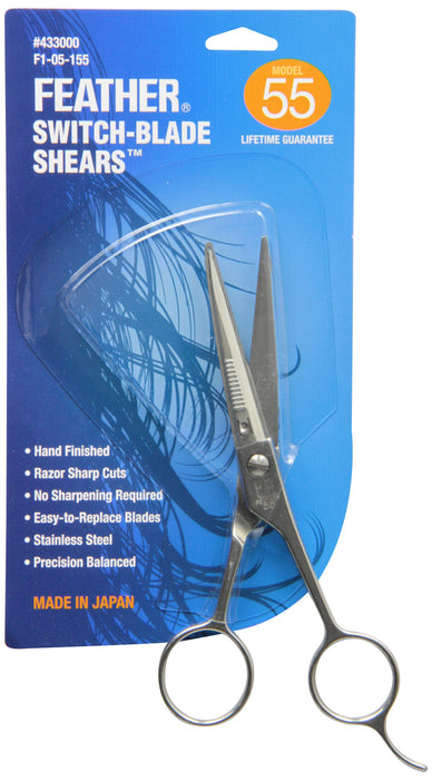 Feather Model 55 switch-blade hair shears in retail packaging with blue background