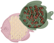 Fish-shaped green and pink silicone slow feeder bowls with kibble and food compartments