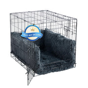 Gray fluffy dog crate bumper and mat set displayed in wire dog crate with open door