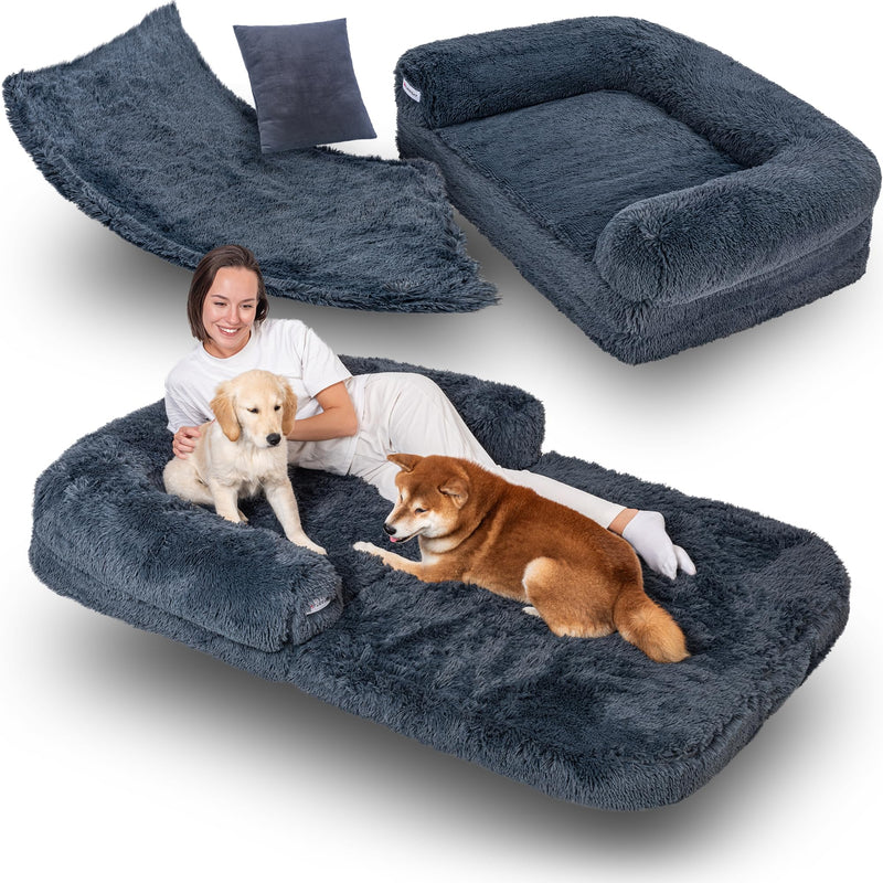 Gray foldable dog bed shown in multiple configurations with woman and two dogs lounging together