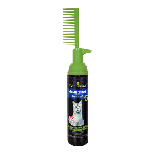 FURminator deshedding foam bottle with green comb attachment on top against white background