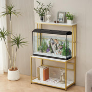 Gold metal aquarium stand with fish tank, white shelves, plants and decorative items displayed