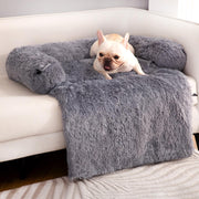 Cream French Bulldog relaxing on gray fluffy couch protector blanket on white sofa