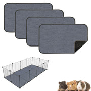 Four gray washable cage liner mats stacked with one corner folded, plus cage setup and guinea pigs