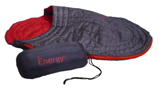 Gray and red quilted dog sleeping bag partially unzipped with matching stuff sack beside it