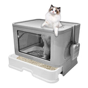 Gray top entry cat litter box with ragdoll cat sitting on top and pullout drawer extended