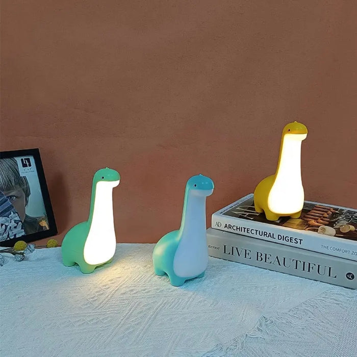 Green dinosaur night light with warm LED glow for children
