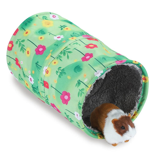Guinea pig emerging from green floral tunnel hideout with dark fleece interior lining