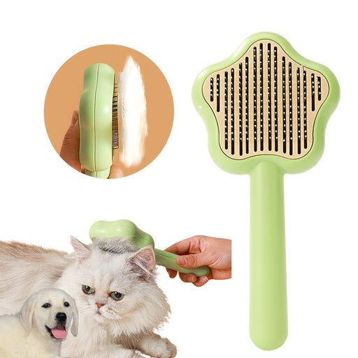 Green pet brush with star-shaped head showing bristles, steam cleaning feature and pets