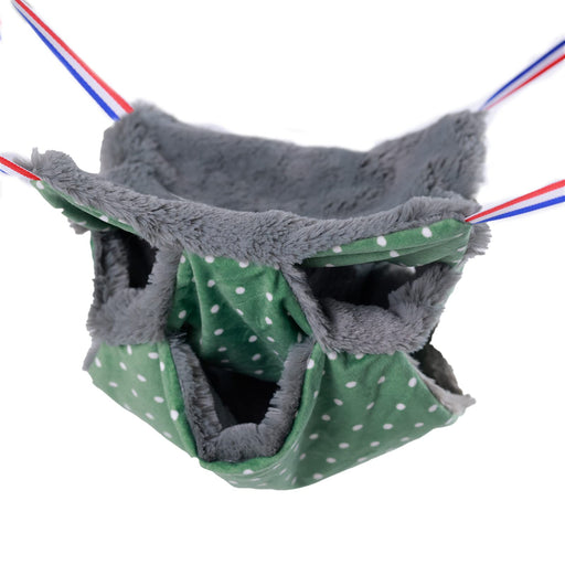 Green polka dot small pet hammock with gray fleece lining suspended by colorful cords