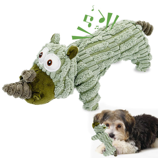 Green corduroy rhinoceros plush dog toy with music notes and small dog playing with it below