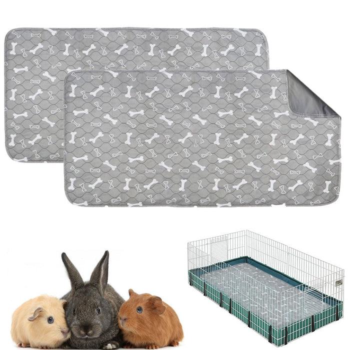 Grey waterproof guinea pig fleece cage liners with white bone pattern, shown with small animals