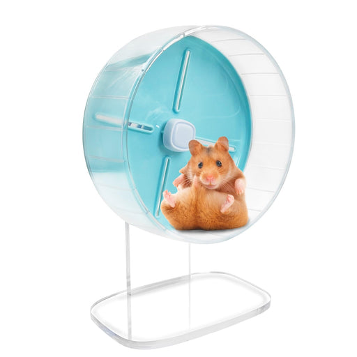 Orange hamster sitting inside clear plastic exercise wheel with turquoise center on white stand