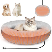 Gray heated pet bed with orange heating elements and fluffy cat lying inside, controller shown above