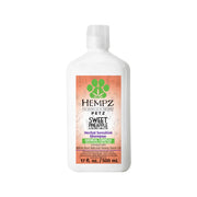 White bottle of Hempz Sweet Pineapple & Honey Melon herbal sensitive dog shampoo with coral label