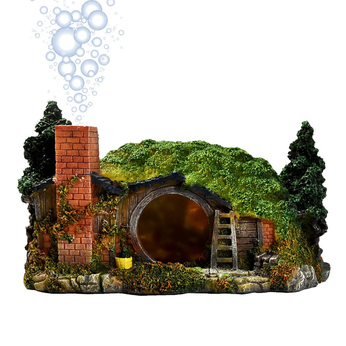 Hobbit house aquarium decoration with moss-covered roof, brick chimney, and round wooden door