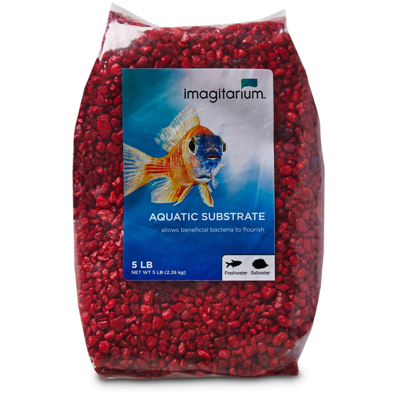 Bag of red aquarium gravel with Imagitarium brand label showing colorful fish and product details