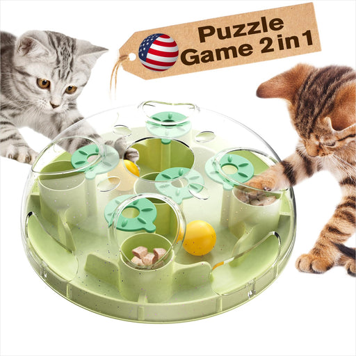 Two kittens playing with green transparent puzzle ball toy containing treats and yellow balls