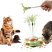 Green 3-level interactive cat toy with feather wand attachment and two cats playing