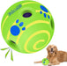 Green interactive dog ball with blue paw prints and holes, shown with golden retriever below