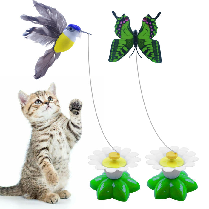 Striped kitten playing with electric flying bird and butterfly cat toys with suction cup bases