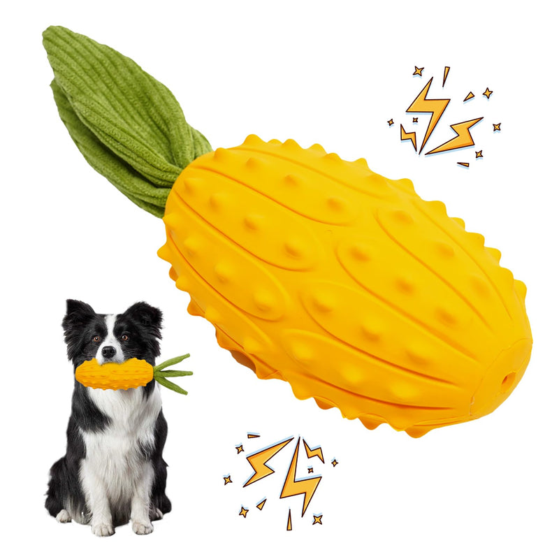 Yellow textured kiwano-shaped dog toy with green rope leaves next to black and white Border Collie
