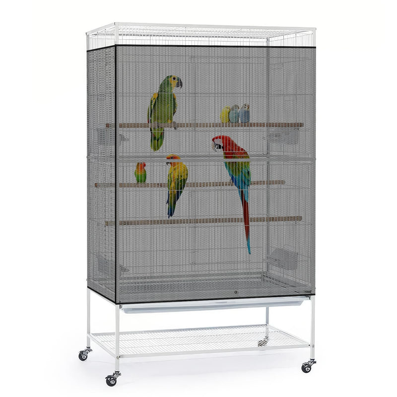 White metal bird cage on wheels with multiple perches and colorful parrots inside