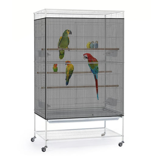 White metal bird cage on wheels with multiple perches and colorful parrots inside