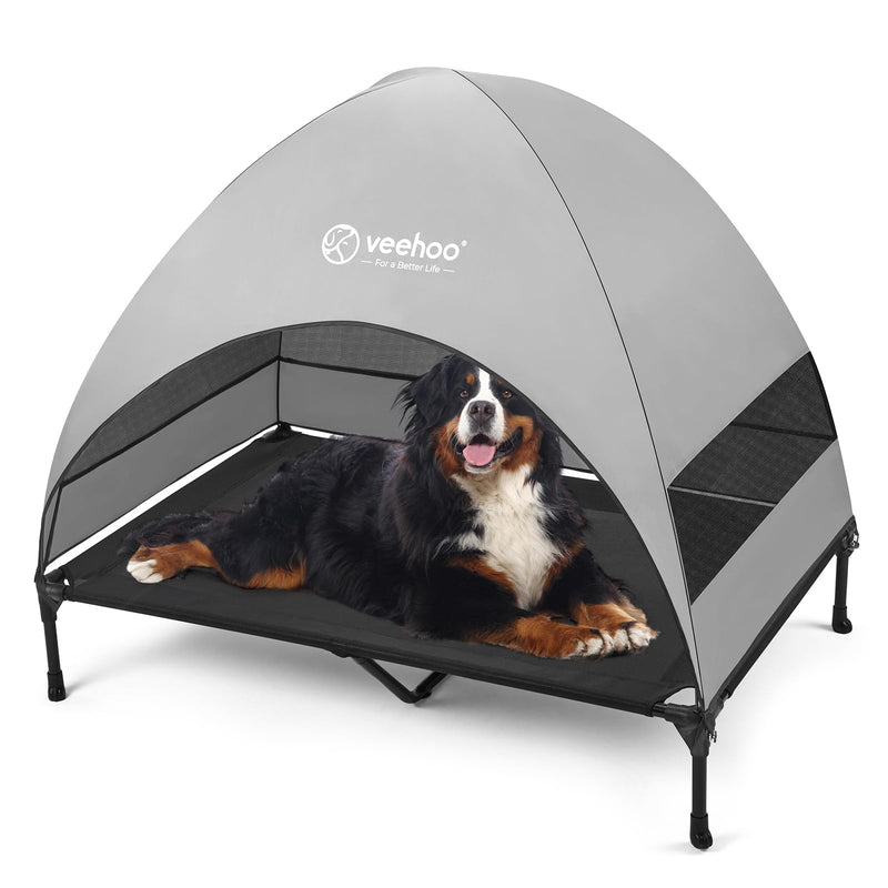 Large Bernese Mountain Dog lying on elevated outdoor canopy bed with gray tent-style cover