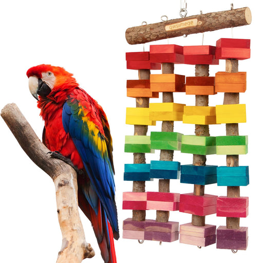 Red macaw parrot next to colorful wooden block chew toy with rainbow layers hanging