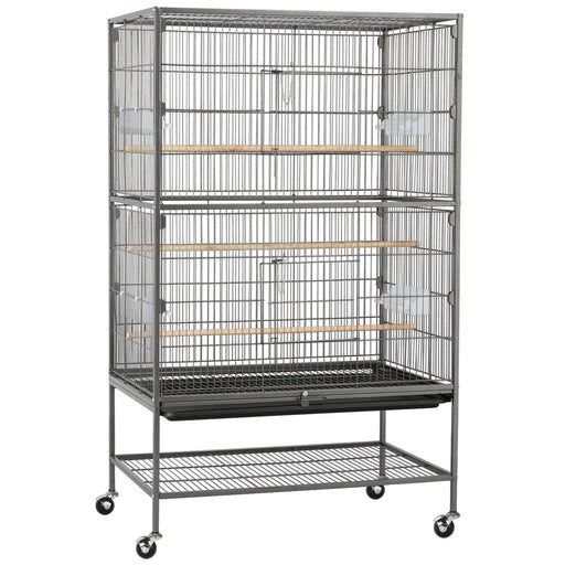 Large gray metal bird cage with wooden perches and food bowls on wheeled stand