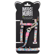 Colorful striped cat harness and leash set in retail packaging with Max & Molly branding