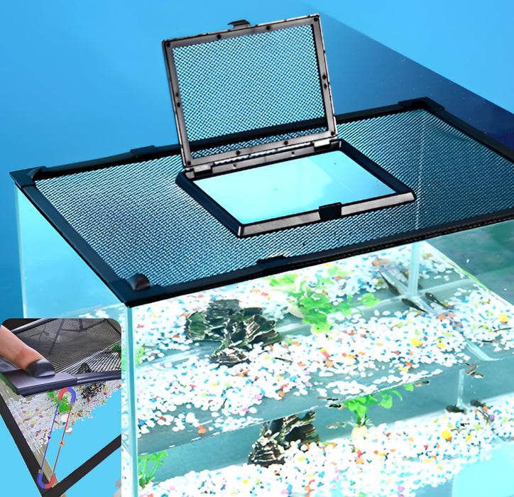 Mesh aquarium lid with hinged feeding door positioned over fish tank with colorful gravel