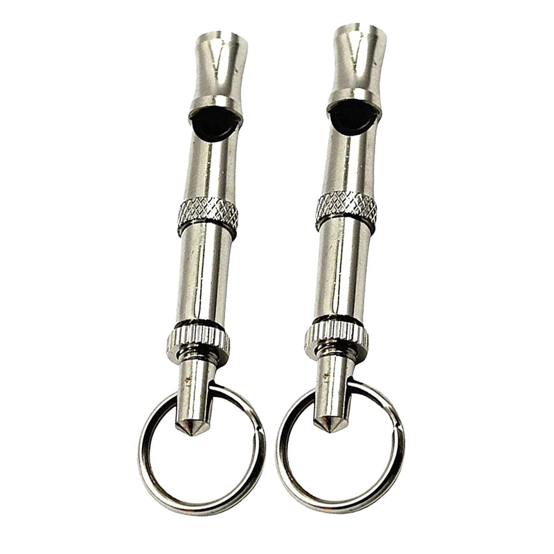 Two silver metal dog training whistles with keyrings displayed vertically on white background
