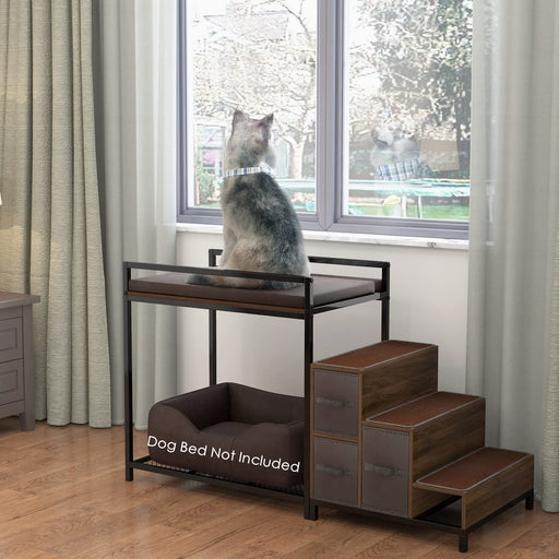 Gray cat sitting on elevated brown cushioned perch beside window with wooden steps attached