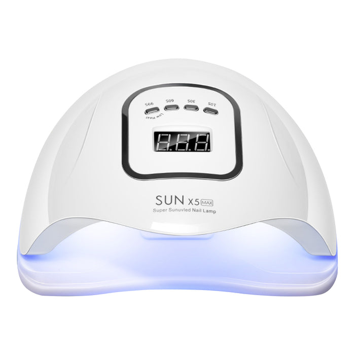 Nail dryer lamp features infrared sensor for hands-free operation convenience